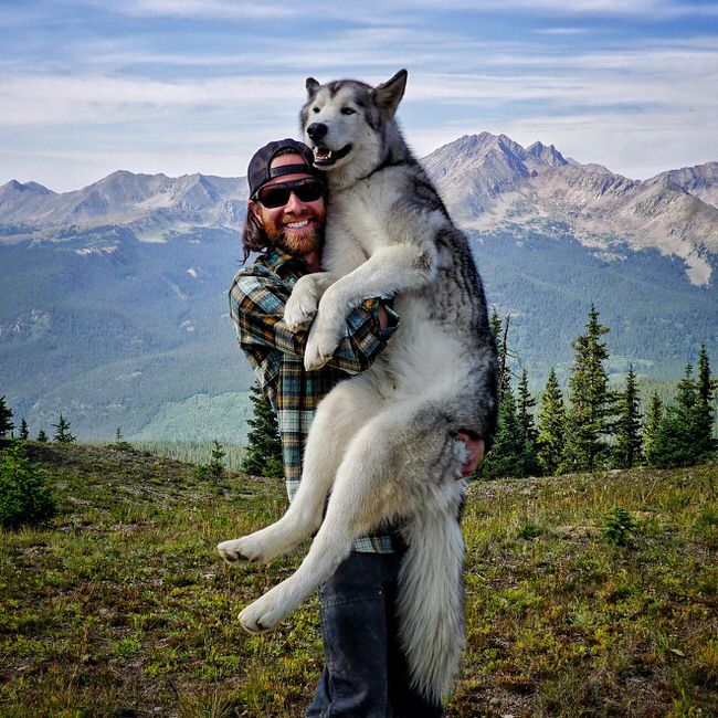 Man holding his dog