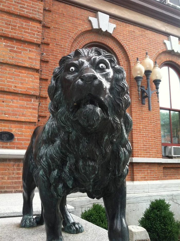 lion-statue-with-googly-eyes